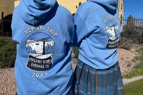 The ski trip logo contest is hosted by Xavier’s Girls Ski Committee. Kathryn Nilssen, a senior at Xavier, received first place in the annual ski trip logo contest, resulting in her design on the iconic ski sweatshirt daughters receive on the trip.