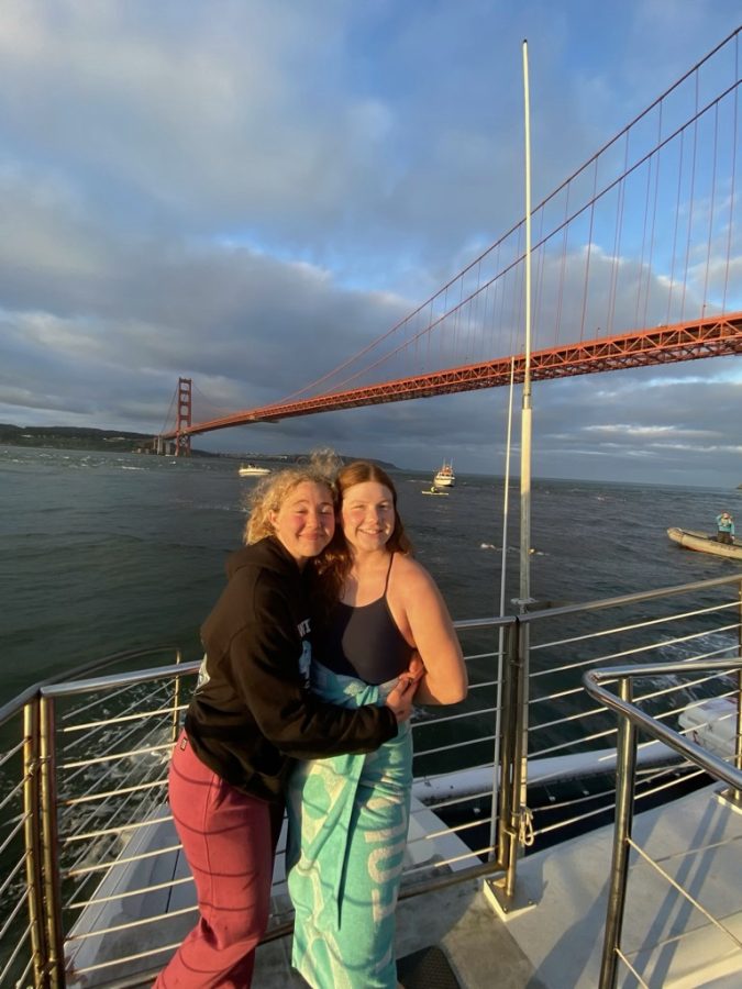 Sophie+Dumanski+poses+in+front+of+the+Golden+Gate+Bridge+with+her+teammate+after+swimming+its+length.+Accomplishing+this+goal+helped+raise+money+for+the+Neptune+Swimming+Foundation+and+water+safety.