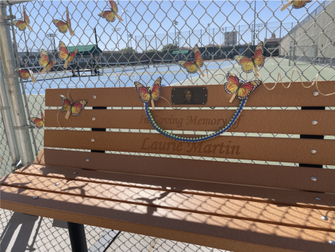 In front of the Laurie Martin Championship Court, a bench with Martin’s face and name was created. The bench allows the spirit of Martin to be around the players who are playing on the court.