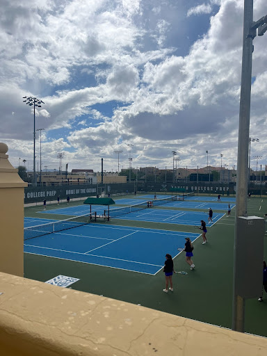 On Thursday March 30, the Xavier varsity team warms up for its match against the Chandler Wolves. The
 Xavier Gators came out victorious, winning 7-2. 