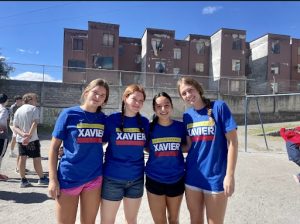 Courtesy of Ellie Crossley
On the Ecuador trip, the building behind the Xavier students is where they stayed. Connected to the same building of residence was a school where Xavier students spent their day playing soccer on field day. 