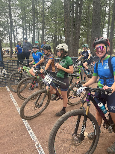 On September 10 in Flagstaff, Xavier mountain bikers pose as they are about to head off. Xavier won 1st place, making them No.1 in the Southern Conference. (Photo courtesy of Rich Perrott)