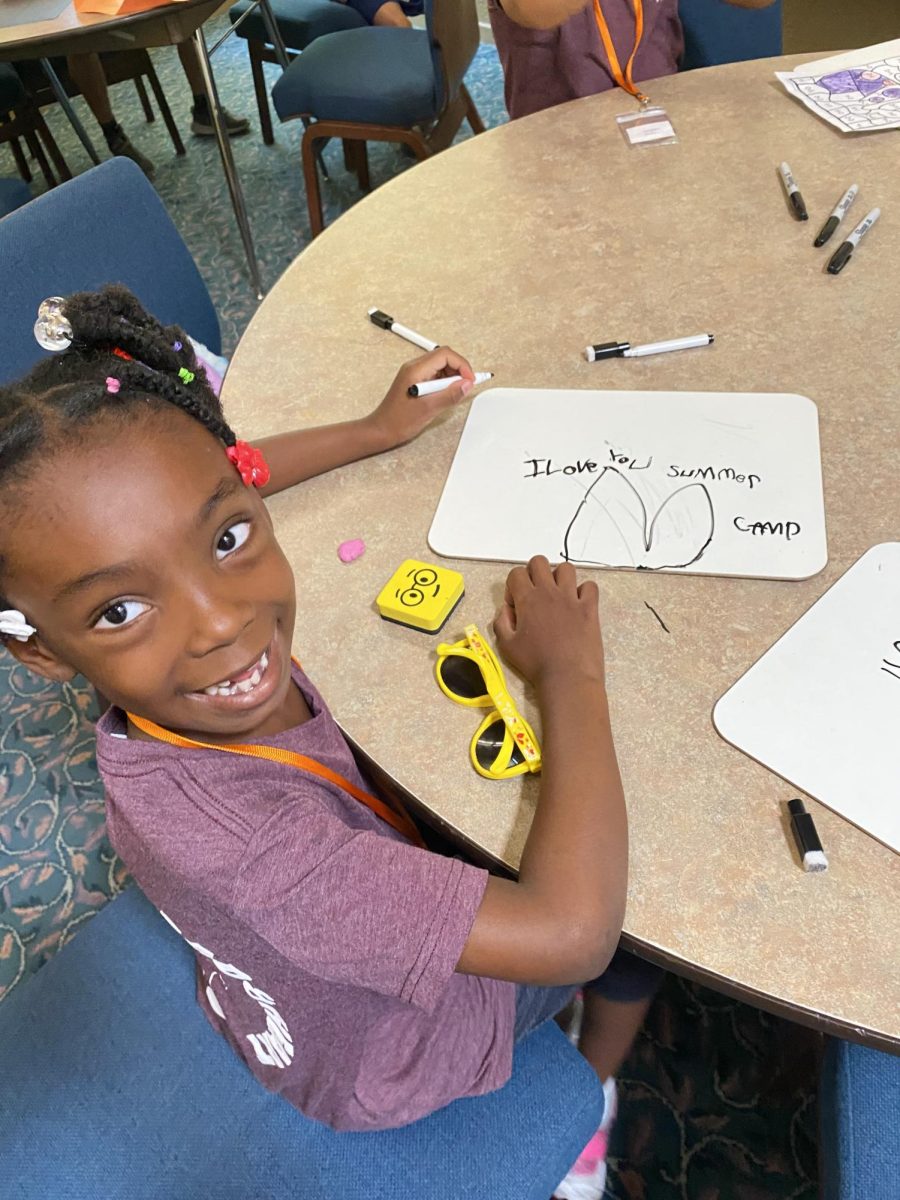 A MathMagician member participates in one of the activities the summer camp has to offer. This summer program created by two juniors helps kids with learning disabilities develop a love for math. (Photo courtesy of Kaitlyn Markham)
