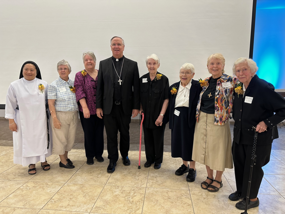 Sister Lillian Lila, far right, stands with other Jubilarians and Bishop John P.  Dolan on October 28 at an Oktoberfest celebration held at Founders Hall. This year Sister Lillian celebrates 75 years as a Sister of Charity of the Blessed Virgin Mary.