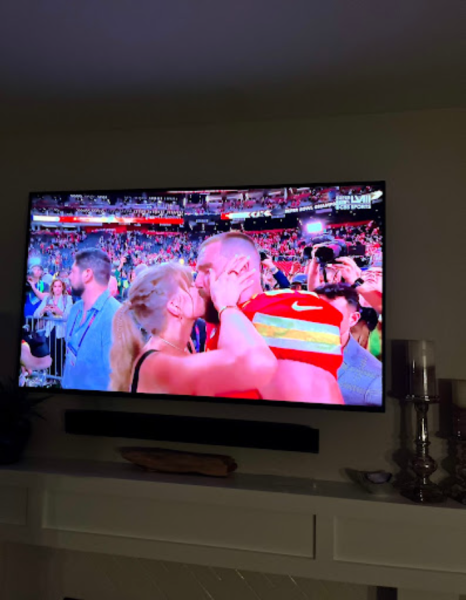 Many viewers gather around their televisions to watch Superbowl LVII, and they witness Swift and Kelce kissing after the Chiefs win. This photo was captured on live television after Kelce gave his speech at the Trophy Ceremony.