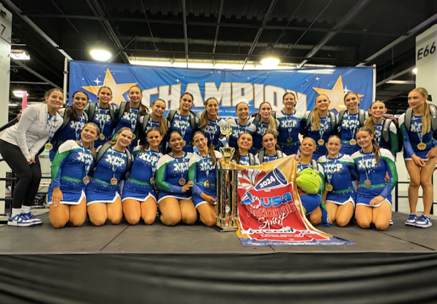 Xavier Prep’s spiritline poses with one of its two trophies from wins in Medium Show Cheer Advanced and Super Crowdleader at USA Spirit Nationals on February 16-18 in Anaheim, California. These athletes have been preparing for the 2024 national competition since August of 2023. (Photo courtesy of Taylor Van Arsdall)