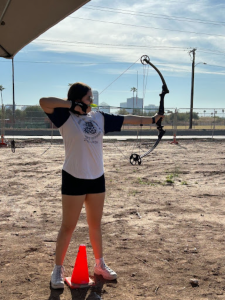 On a Friday afternoon in early March, Camila Beltran-Felix 25 is practicing her “holding,” one of the 11 steps to shooting success. Beltran-Felix was working on her form to prepare for the upcoming archery tournament. (Photo courtesy of Isabella Ballesteros)