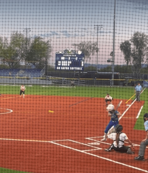 McKenna Hackett steps up to the plate on Senior Night on April 19, 2024. She hits a single, making it onto first base.