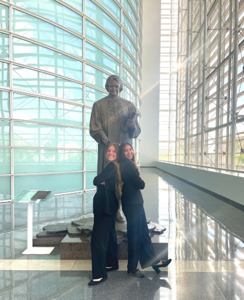 Cara Schilinger ‘24 and Sonya Collatur ‘24 pose in front of the Sandra Day O’Connor Memorial. The Arizona High School Mock Trial State Competition was hosted at the Sandra Day O’Connor Federal Courthouse on March 23. (Photo courtesy of Asiana Guang)