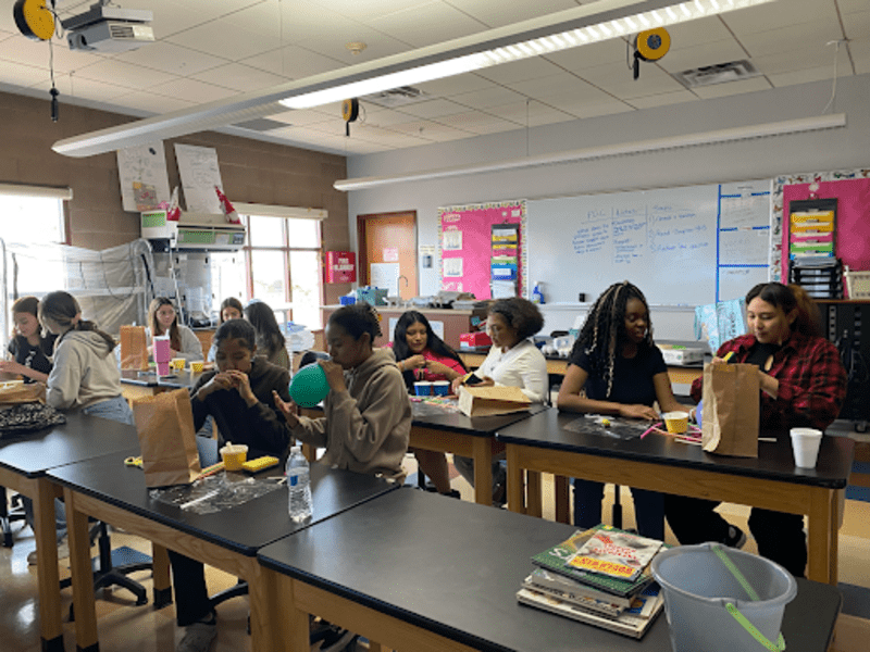 STEMpoweringHER+went+to+the+Girls+Leadership+Academy+of+Arizona+%28GLAAZ%29+on+April+5%2C+2024%2C+to+participate+in+an+egg-drop+experiment+using+engineering+and+physics.+The+students+were+split+up+into+groups+and+given+a+range+of+materials%2C+including+balloons+and+sponges%2C+to+use+in+the+design+and+construction+of+a+device+that+would+protect+their+delicate+cargo%E2%80%94an+egg%E2%80%94during+a+fall+from+a+ten-foot+stairway.