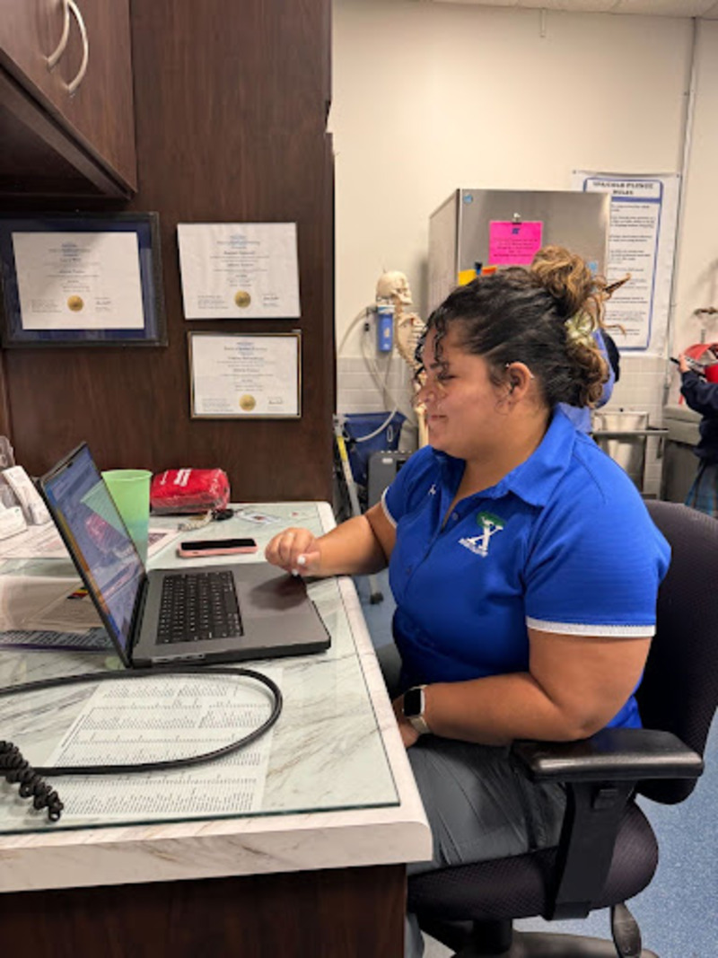 Lithany DeVontenno stays up-to-date on athletes' schedules to manage their injuries. Her dedication ensures that each athlete receives the care she needs to stay in peak condition.