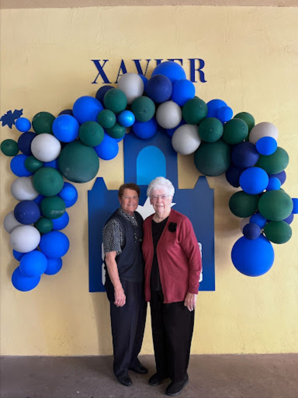 On Friday, September 13, Sister Lynn Winsor (left) and Sister Joan Fitzgerald stand commemorating their years together. Fitzgerald and Winsor returned from making speeches honoring the freshwomen grandparents.  