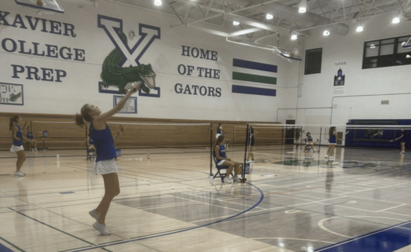 Badminton captain Maggie Henry ‘25 serves for greatness, preparing for a singles match. On September 26 the Gators won 9-0 and are currently ranked No. 4 in the state.