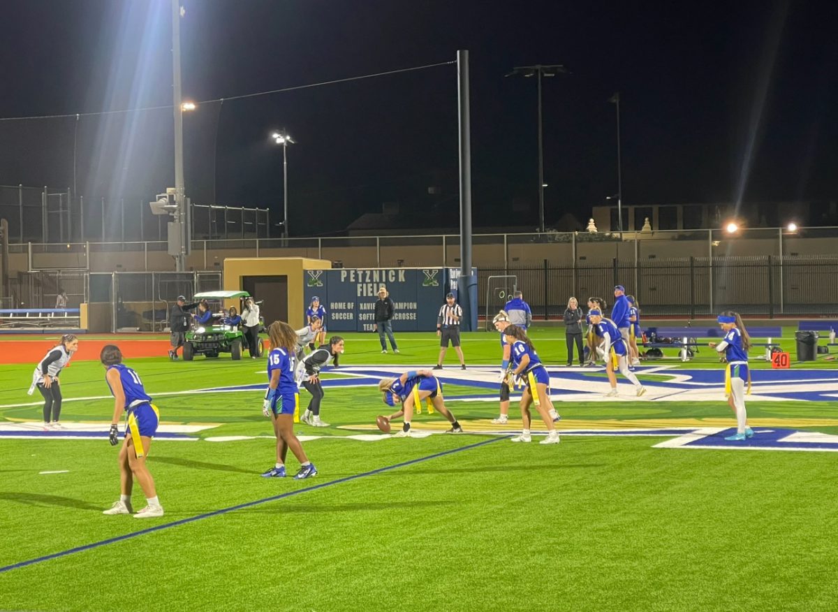 Xavier flag football lines up to begin a new play during its game against Sunnyside High School at Petznick Field on Thursday, November 7.