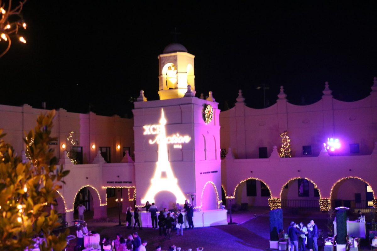 On November 9, Xavier hosted its annual Mothers’ Guild dinner and auction. This year was themed “Parisian Nights” and featured an overlay of the Eiffel Tower over the bell tower.