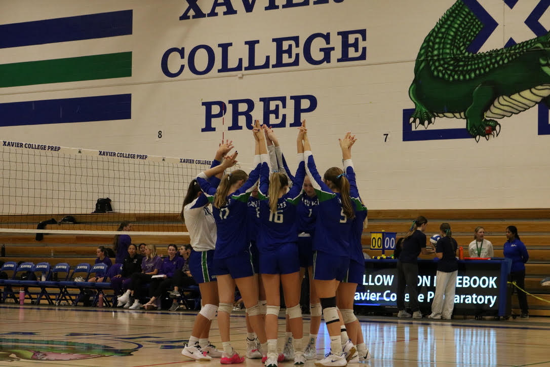 The seven Gators starting against Millennium stand together before the first serve. After the huddle, the lineup is checked. The starting libero, Mattea Saunders ‘26, will come in and the game will begin.