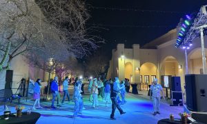 Xavier fathers and daughters dance in coordination to the Cha-Cha-Slide in front of Founders Hall on February 8 at the Father-Daughter Luau. DJ Matt was playing “Cha-Cha-Slide” by Mr. C, and the lights projected blue and green on the dance floor. 