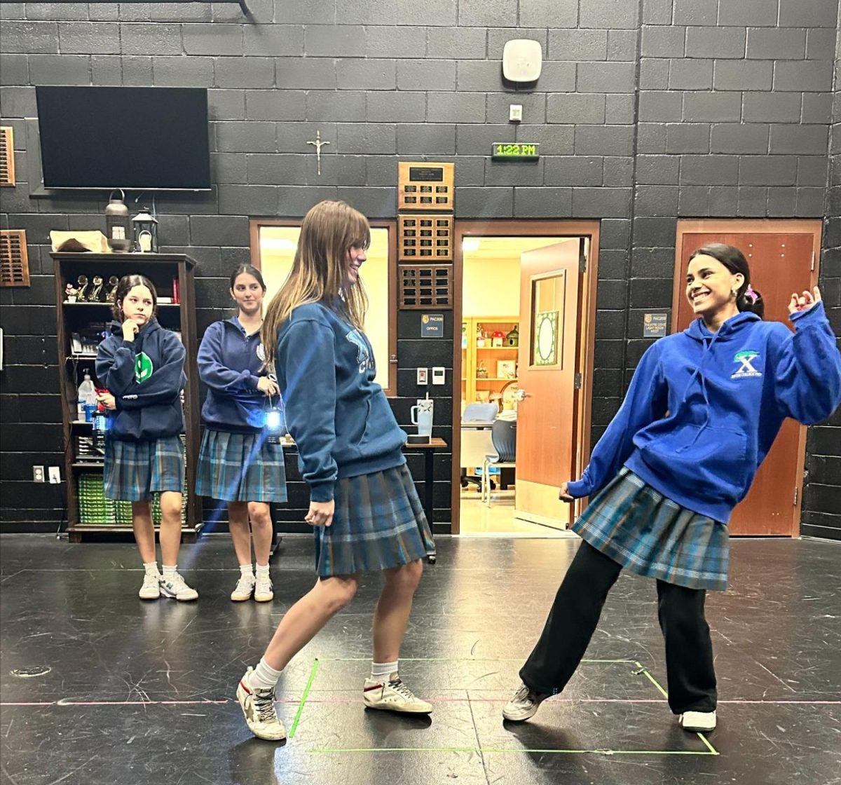 Xavier juniors Avery Stewarts, Cecily Montes, Phoebe Kleinlein and Alana Thomas practice a number in preparation for “Hadestown.” These Gators have been working since December, perfecting their choreography along the way. 