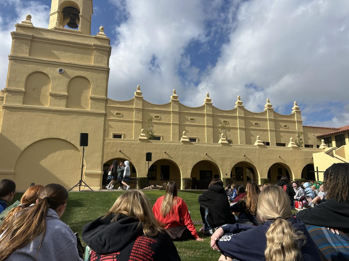 On Monday, January 27, 2025 and the first day of Catholic Schools Week, girls dressed in their “Merch Monday” attire join at the Bell Tower to watch and vote on the winner of the lip sync battle. Many students wore sweatshirts from recent concerts and tours, the most popular being Zach Bryan, SZA, Taylor Swift and Morgan Wallen.