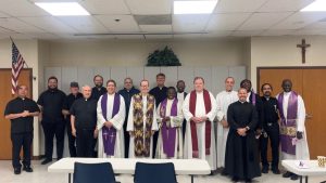 Arizona priests from around the state attend Xavier’s all-school reconciliation service on Monday, March 24. Each priest wore similar garments and assisted students in Xavier’s Winsor Activity Center. The purple stoles around their necks signify penance and preparation. 
