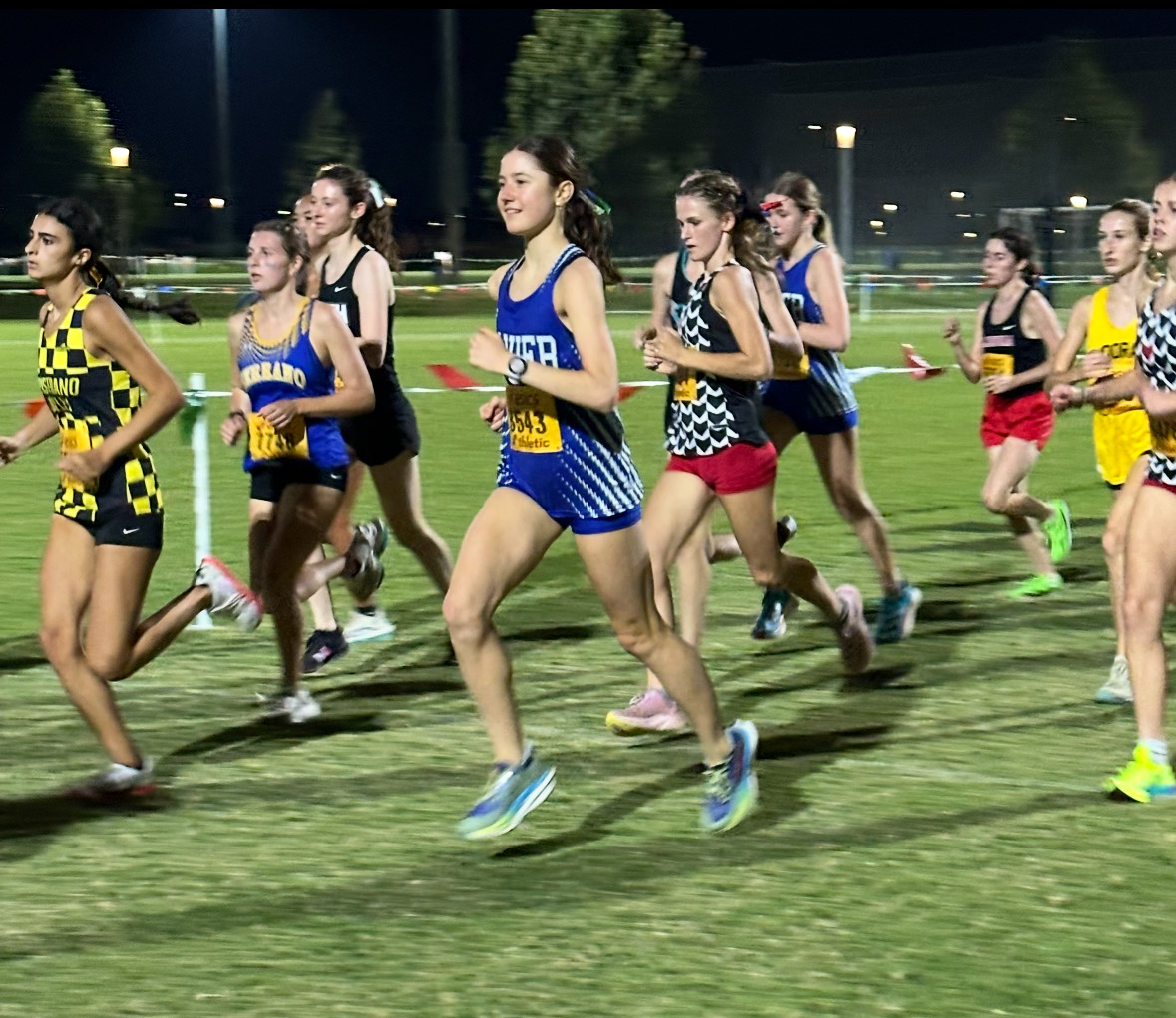 Senior Kaitlyn Markham races at the elite Woodbridge meet held in Orange County during the fall of 2024. Markham will pursue her academic career at Baylor University, leaving both the course and track behind. 