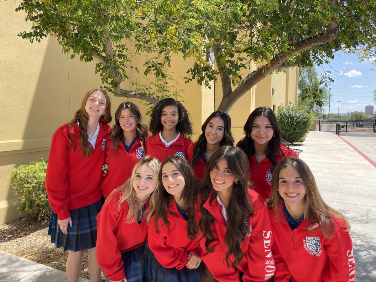 On August 14, XPress seniors pose for the camera wearing their senior sweatshirts. On this day, they took their photos for staff profiles.