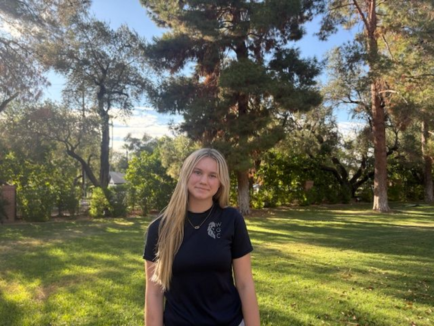Savannah Moore ‘29 wears her WGC (Wright Gymnastics Center) shirt as she prepares to volunteer in the afternoon. She spends her time helping girls achieve skills and building confidence for their futures. 
