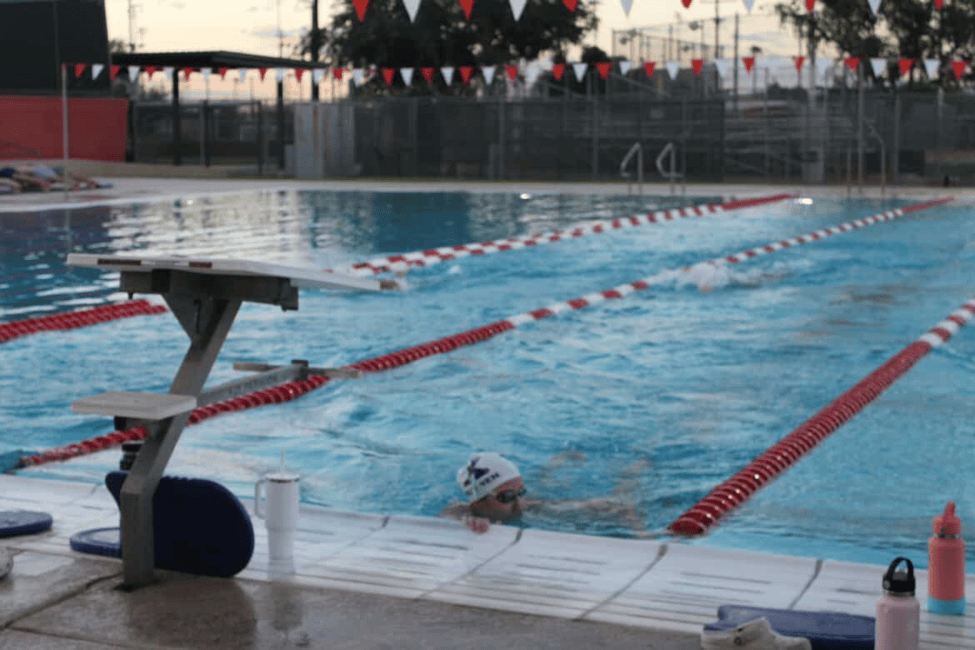 Adylen Burns practices for an upcoming swim meet. The swim team is preparing for one of their final regular season meets the following day.