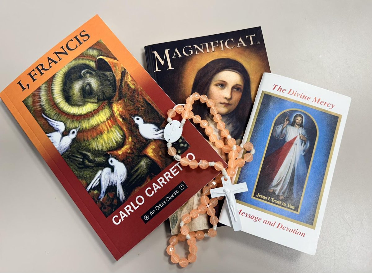Sister Isabel Conchos uses prayer books daily to reflect in the chapel. More recently, she has begun reflecting and learning about St. Francis Xavier and his life.