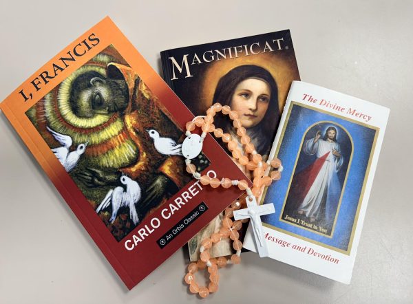 Sister Isabel Conchos uses prayer books daily to reflect in the chapel. More recently, she has begun reflecting and learning about St. Francis Xavier and his life.