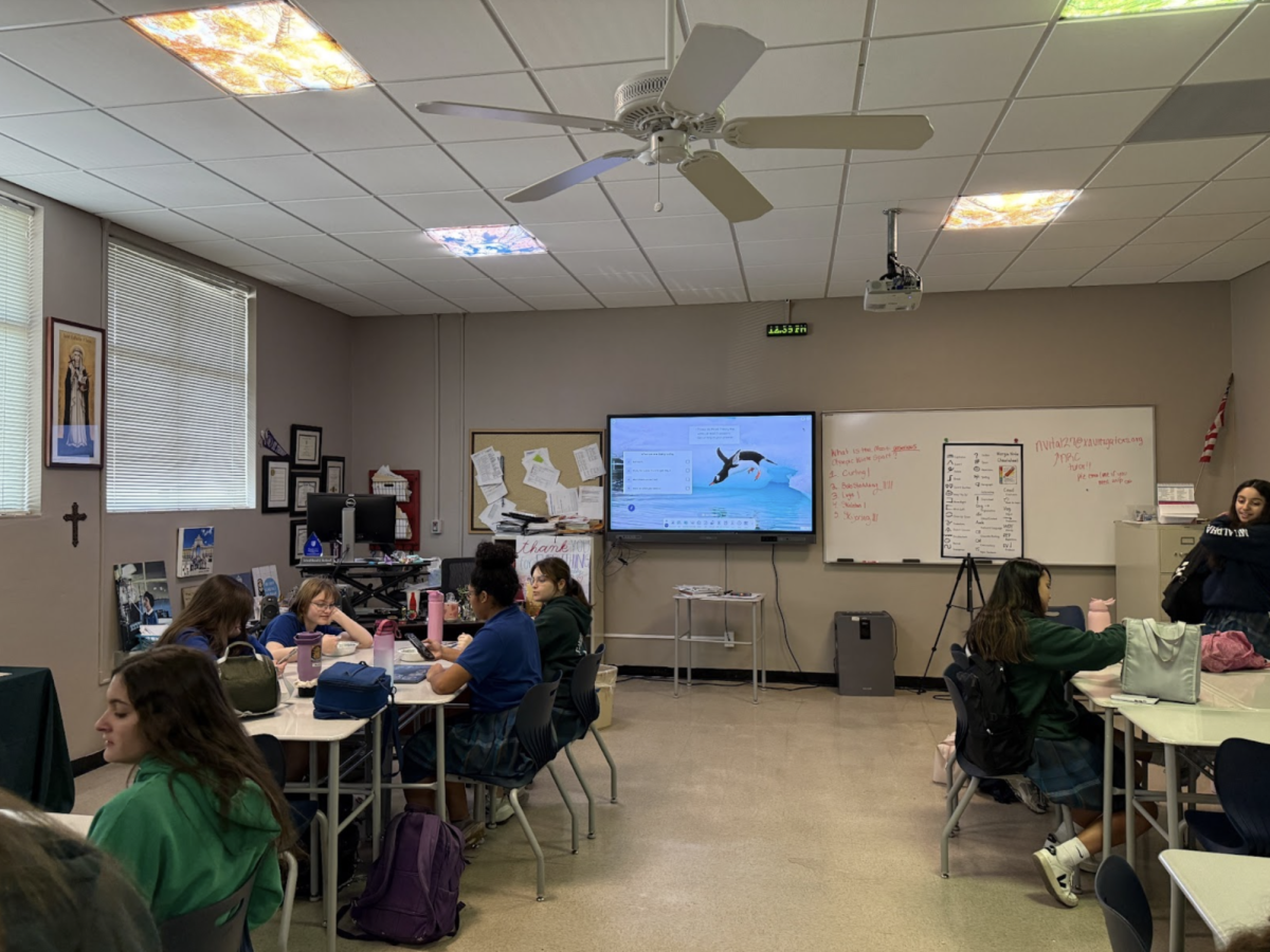 Xavier students eat lunch in the ARC classroom, a space that also houses the Strategies course. While the class builds reading comprehension and study skills during the school day, the room remains open to all students during break periods.