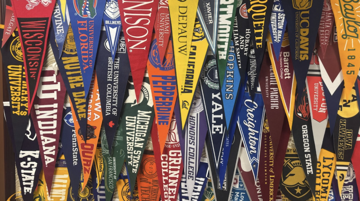 Banners of the colleges Xavier College Preparatory students attended hang in the counseling department. Many of the schools included are Catholic schools, such as Creighton.
