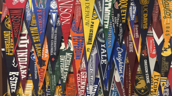 Banners of the colleges Xavier College Preparatory students attended hang in the counseling department. Many of the schools included are Catholic schools, such as Notre Dame and Creighton.