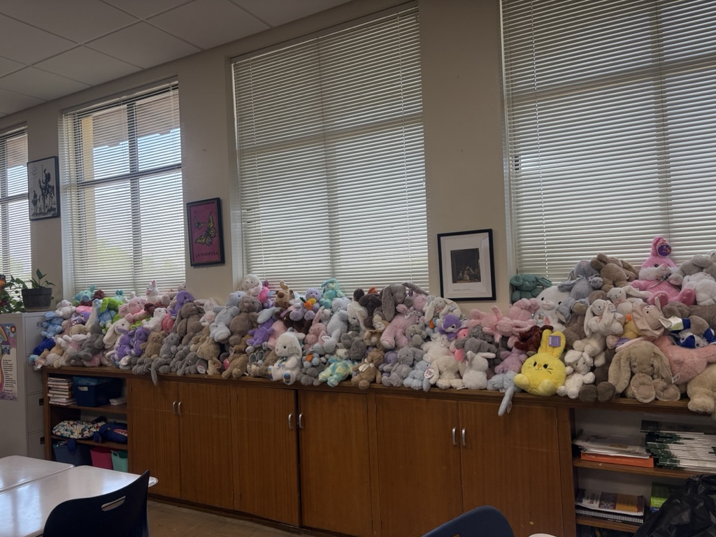 Spanish teacher Noemi Santaella’s classroom is lined with donated bunnies for a Phoenix Children's Hospital drive. This reflects how Xavier students are turning Easter’s message into something real. 