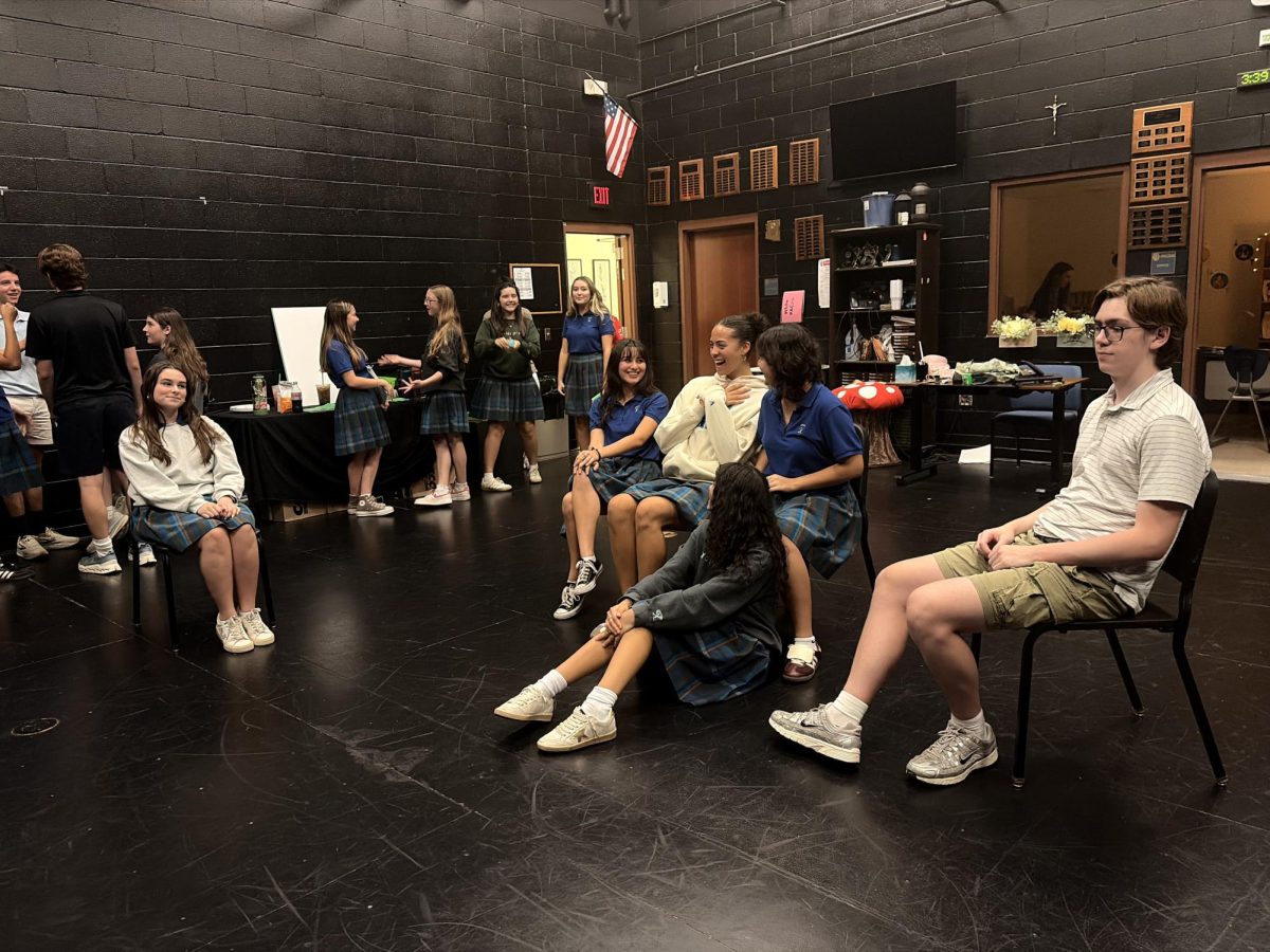 Members of the upcoming production of “Pride and Prejudice" gather in The Brophy Black Box Theater for an afternoon rehearsal session. Behind every production at Xavier are hours of practice, timing and choreography.