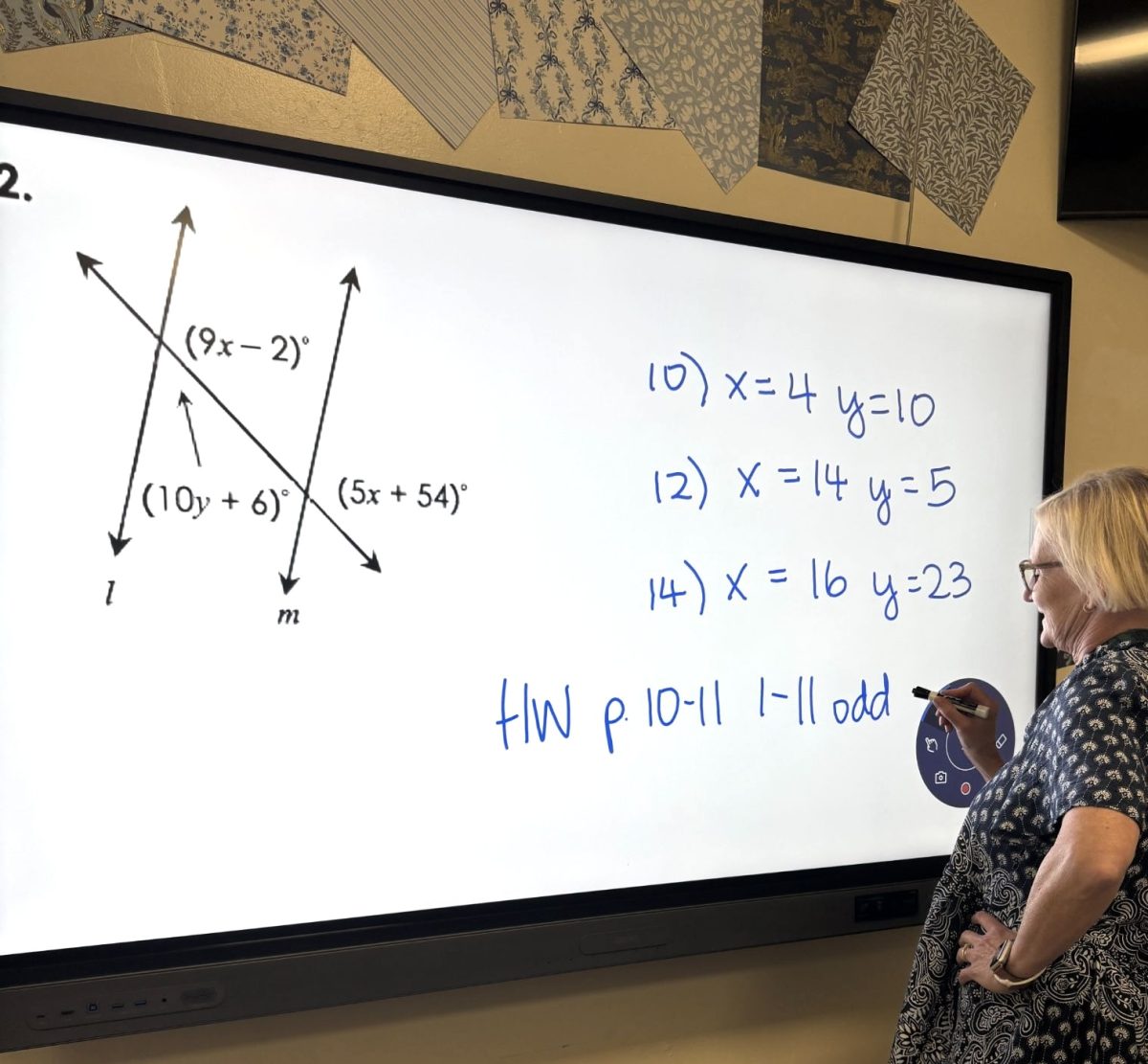 Geometry teacher Deborah Seaquist teaches her students how to solve for angles formed by intersecting lines. On a BenQ Smart Board, she helps them understand the lesson and prepares them for success.
