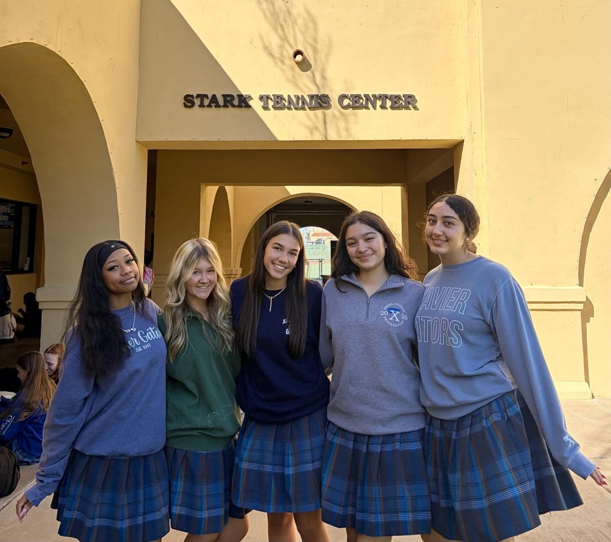 BRIDGE members gather at the iconic bell tower at Xavier College Preparatory on Friday, Oct. 2 during break. They are excited to embark on this new project.